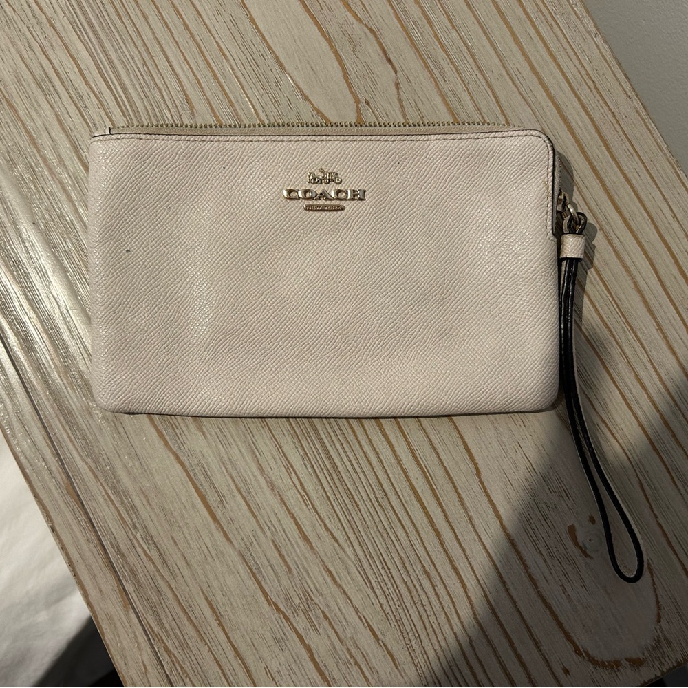 coach | cream wristlet